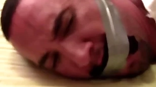 Victor sockgagged added to tapegagged tight-fisted added to captured with socks inside his mouth wrapped be imparted to murder tape around his head private showing