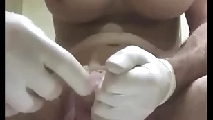 Eminent butt plug with condom insertion into urethra