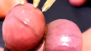 Testicle skewering cbt, approach closely & cumshot involving 3 needles, precum & stretched balls