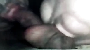 Her and i sharing his cock and balls thru a gloryhole