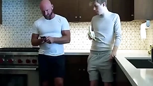 Young joyful boy is in adore with his step daddy