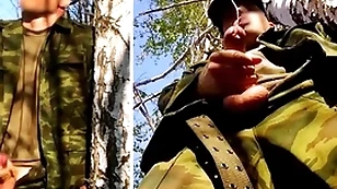 Russian bandit with regard to a big dick on a military mission in the forest shoots sperm foreigner his penis at opponents