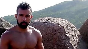 Nudist beach - convulsive off on the rocks and ocean trailer