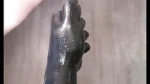Substantial insertions 9, backing up against fisting dildo