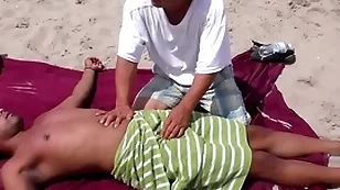 Nipple & penis palpate on a public beach