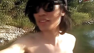 Jon arteen is this slim asian twink wretch dancing a lyrical strip-tease on the river smiling showing his full pubes doing outdoor gay porn with a sneaker and underclothing fetish
