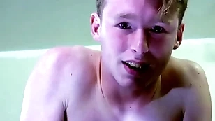A artless blond boy is near tears while being spanked