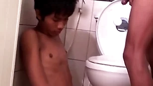 Asian bareback twink fucks pissing stud back doggystyle