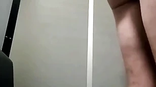 Sucking two dicks at the glory hole